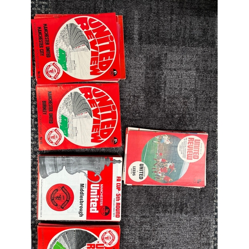 209 - Large selection of approximately 185 Manchester United review football programmes.

Dates ranging fr... 