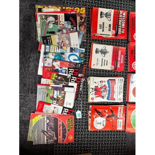 209 - Large selection of approximately 185 Manchester United review football programmes.

Dates ranging fr... 