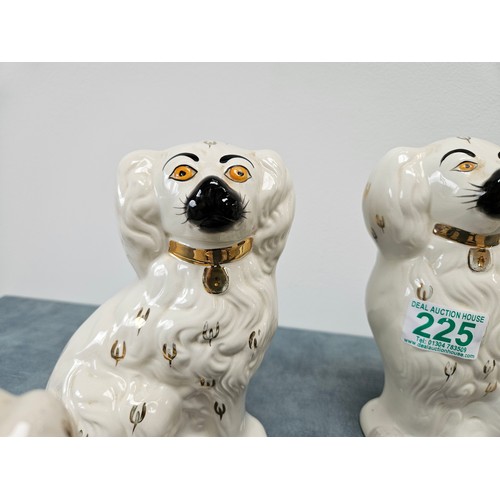 225 - 6 x graduated size Beswick Staffordshire flatback style dogs. 
Pair of large, medium and small dogs.... 