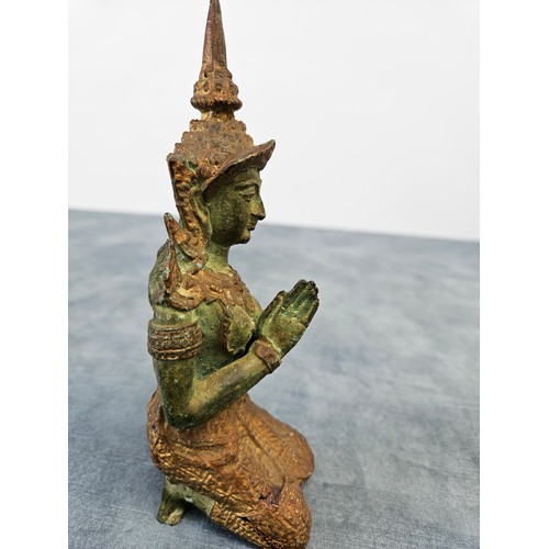 279 - Bronze Thai kneeling temple guardian - Thepanom 
Bronzed and gilt 

17.5cm high x 7cm across base