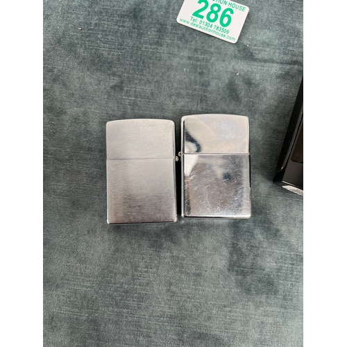 286 - 2 x Zippo lighters USA