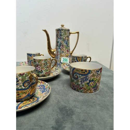 396 - Tea set with teapot, six cups and saucers and sugar bowl