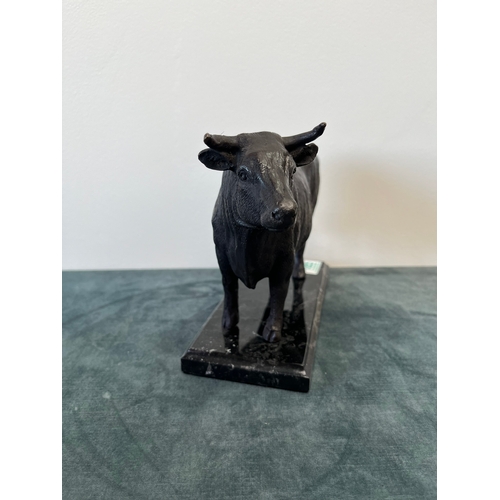 185 - Modern bronze model of a bull on a marble base