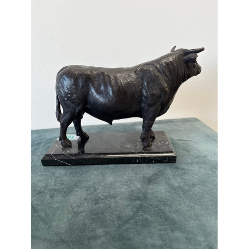 185 - Modern bronze model of a bull on a marble base