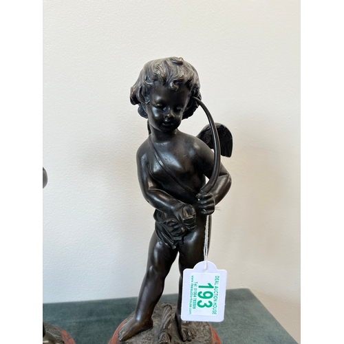 193 - Bronze model of Cupid on a marble base