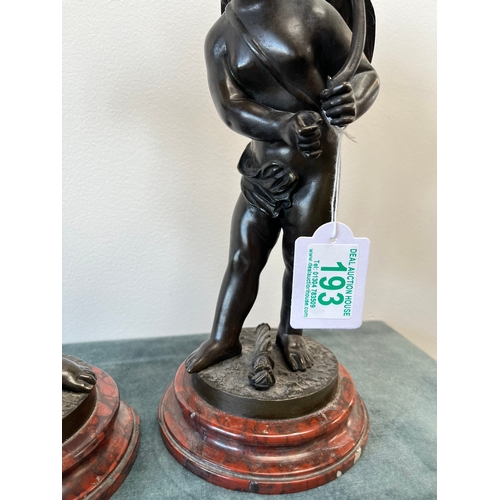 193 - Bronze model of Cupid on a marble base