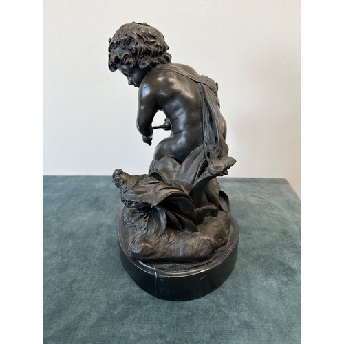 199 - Large modern bronze model of a cherub boy with a chicken.