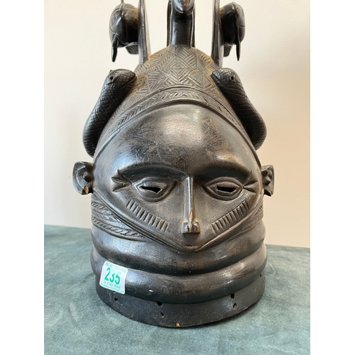 235 - Mende, Sierra Leone dark patina wood dance helmet carved as a female head