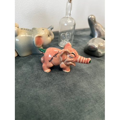 236 - Various items, elephant salt and pepper, glass bottle, aluminum animals etc.