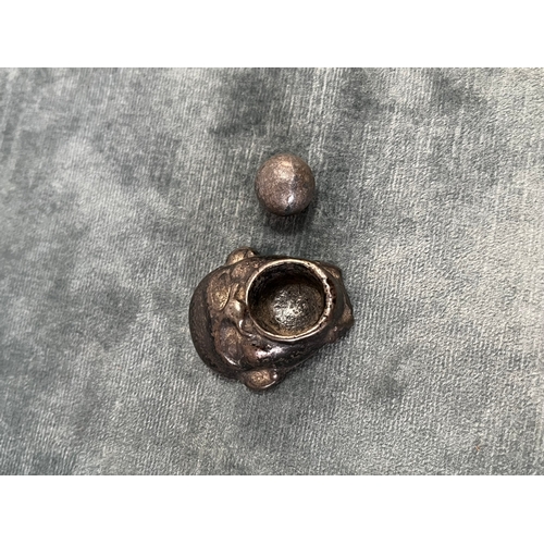 291 - Small novelty metal face with ball