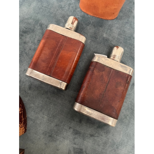 326 - Leather hip flasks in leather case