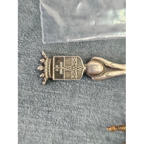 601 - Ypres souvenir spoon and one other base metal Ypres brooch