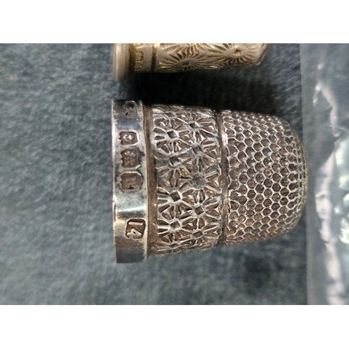 602 - 2 x Small silver thimbles