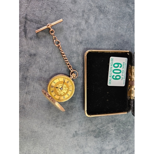 609 - 9ct yellow gold pocket watch along with 9ct gold T bar - Chain and T bar approximately 6g - watch it... 