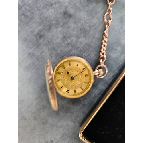 609 - 9ct yellow gold pocket watch along with 9ct gold T bar - Chain and T bar approximately 6g - watch it... 