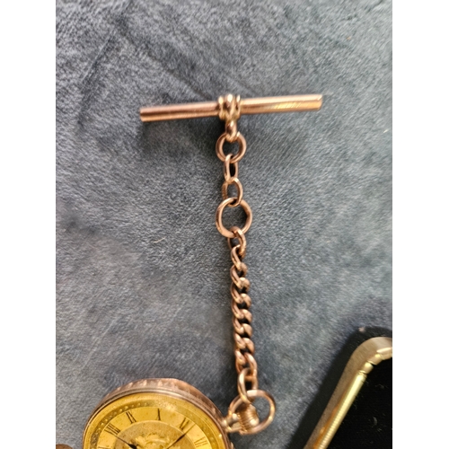 609 - 9ct yellow gold pocket watch along with 9ct gold T bar - Chain and T bar approximately 6g - watch it... 