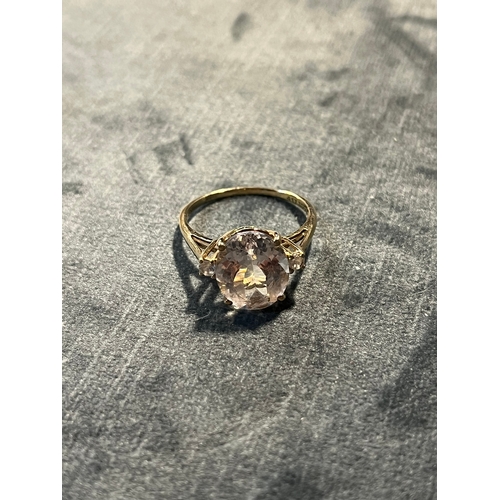 614 - 9ct yellow gold ring with large clear stone