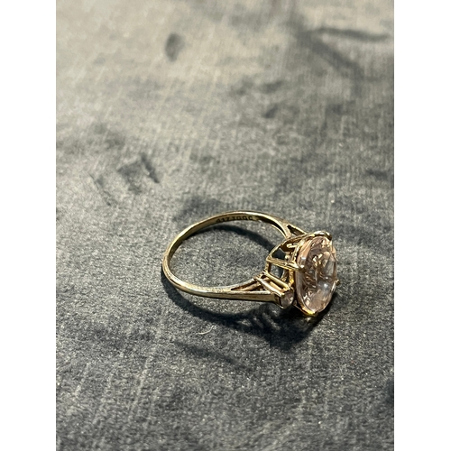 614 - 9ct yellow gold ring with large clear stone