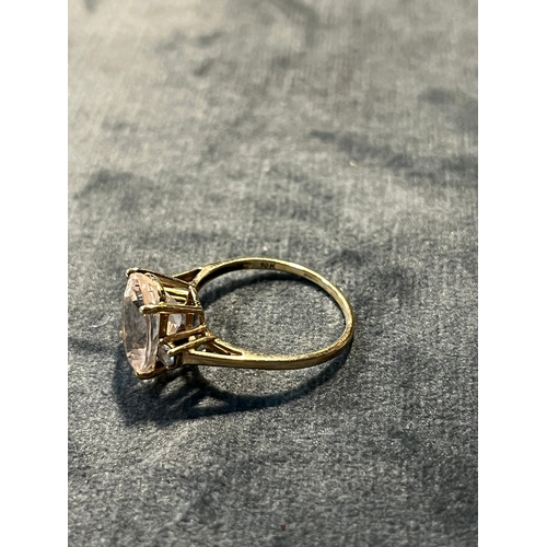 614 - 9ct yellow gold ring with large clear stone