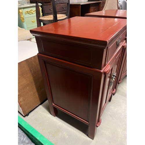 1 - Pair of red oriental side cabinets with brass handles