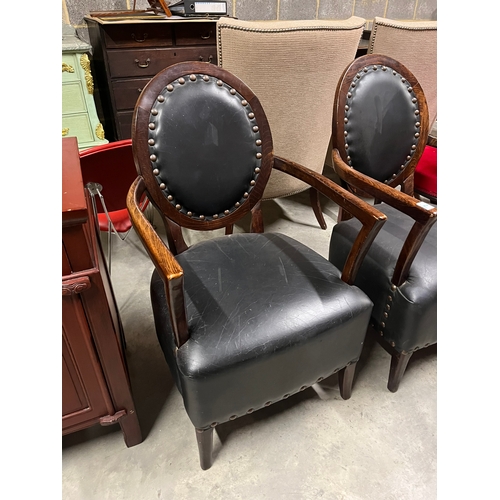 2 - Pair of black leather armchairs with brass stud details