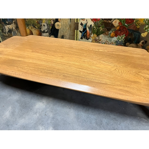 15 - Modern light elm Ercol glass coffee table