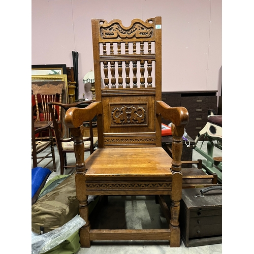 25 - Large very heavy carved armchair