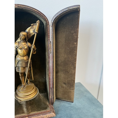 151 - Antique bronze figure of Joan of Ark in leather traveling case 

Signed to base - Ernest Justin Ferr... 