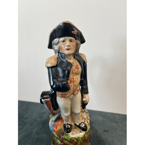 158 - Staffordshire pottery jug depicting Nelson 

28cm High