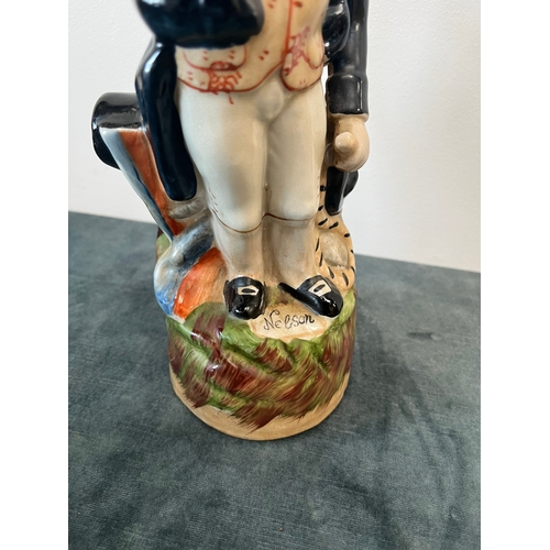 158 - Staffordshire pottery jug depicting Nelson 

28cm High