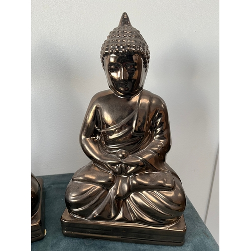 168 - Modern pottery Buddha's

28cm high x 16cm wide