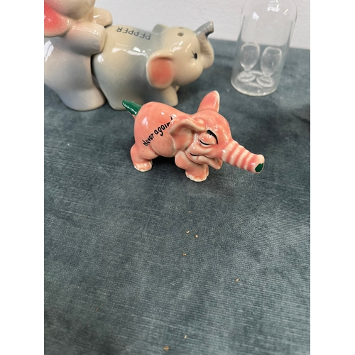 261 - Various items, elephant salt and pepper, glass bottle, aluminum animals etc.