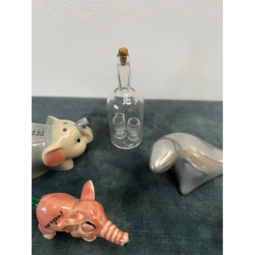 261 - Various items, elephant salt and pepper, glass bottle, aluminum animals etc.