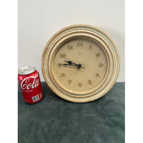 284 - Pottery wall clock - signed to reverse S. J. Arnold