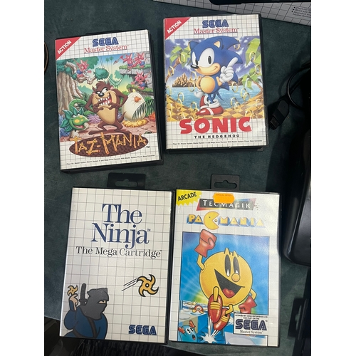 289 - Sega Master System 2 with games - Taz-Mania, Sonic, Pac-Mania, The Ninja + Asterix