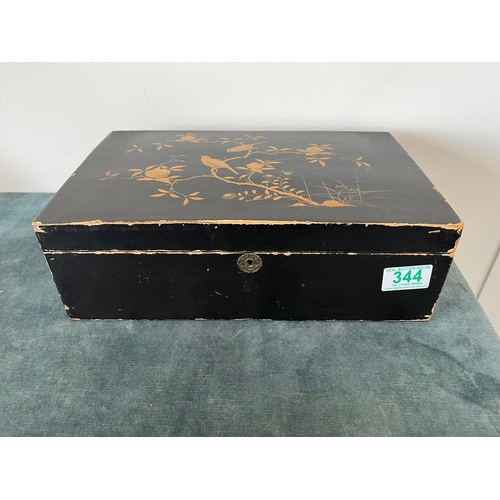 344 - Vintage oriental black lacquer box and decorated - with large selection of sewing apparatus