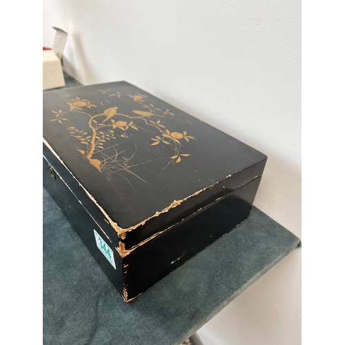 344 - Vintage oriental black lacquer box and decorated - with large selection of sewing apparatus