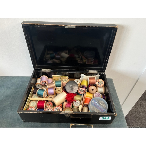 344 - Vintage oriental black lacquer box and decorated - with large selection of sewing apparatus