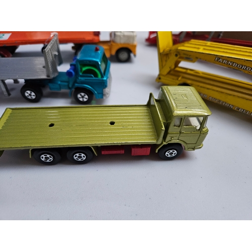 312 - Tray of various trailers and transporters - Dinky, Matchbox ect.