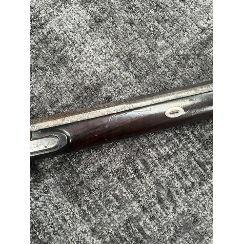 420 - 10 Bore flint lock converted to percussion gun - fowling piece 

Vendors description - Made by a wom... 