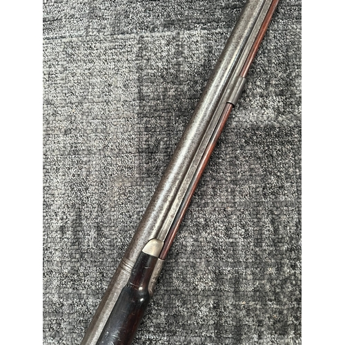 420 - 10 Bore flint lock converted to percussion gun - fowling piece 

Vendors description - Made by a wom... 