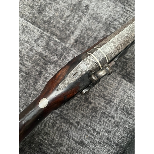 420 - 10 Bore flint lock converted to percussion gun - fowling piece 

Vendors description - Made by a wom... 