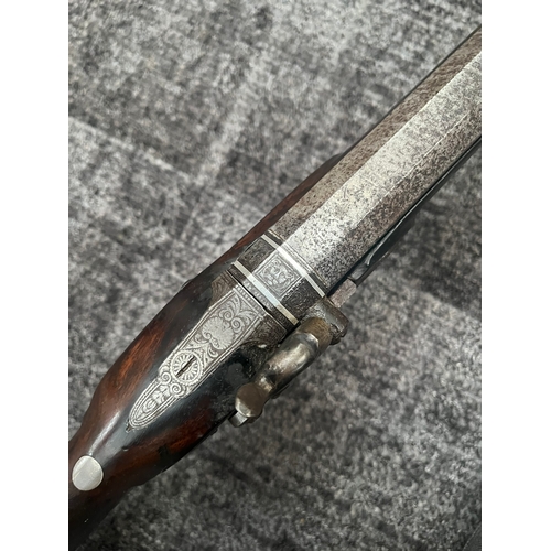 420 - 10 Bore flint lock converted to percussion gun - fowling piece 

Vendors description - Made by a wom... 