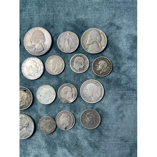 438 - Assortment of silver coins - some British + world