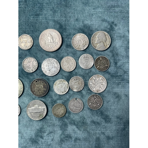 438 - Assortment of silver coins - some British + world