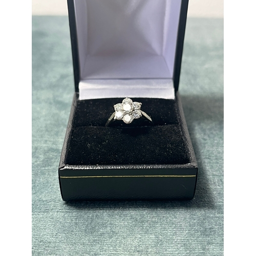 504 - 18ct white gold and diamond flower cluster ring approximately .80 ct