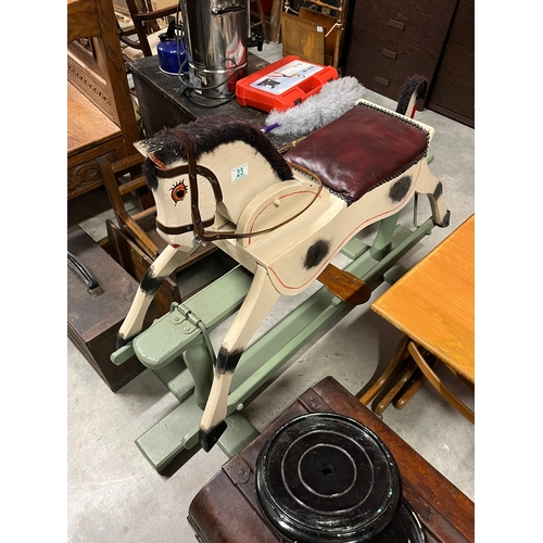 23 - Vintage rocking horse with moving head and moving tail