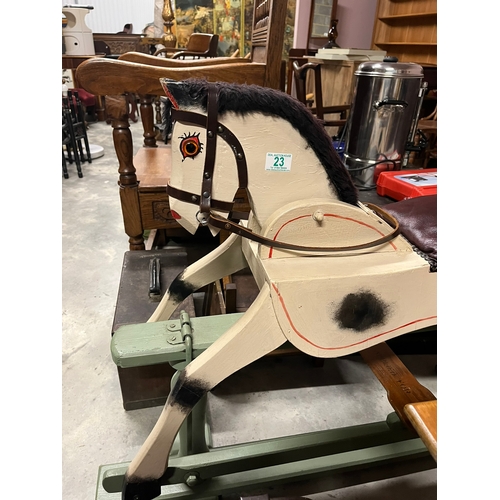 23 - Vintage rocking horse with moving head and moving tail