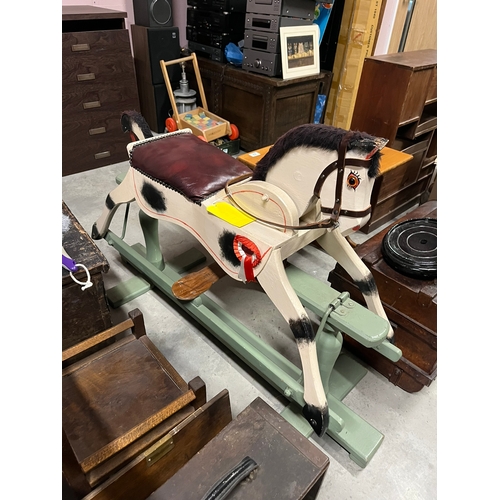 23 - Vintage rocking horse with moving head and moving tail