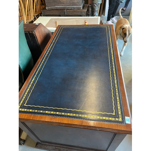 33 - Large leather topped desk with two drawers